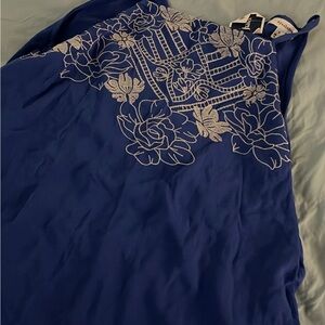 Eyeshadow Blue Top with White Floral Design